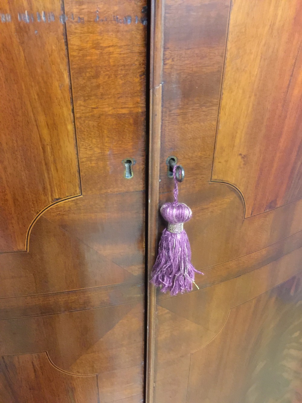 Edwardian Sheraton style serpentine fronted flame mahogany wardrobe  View VI