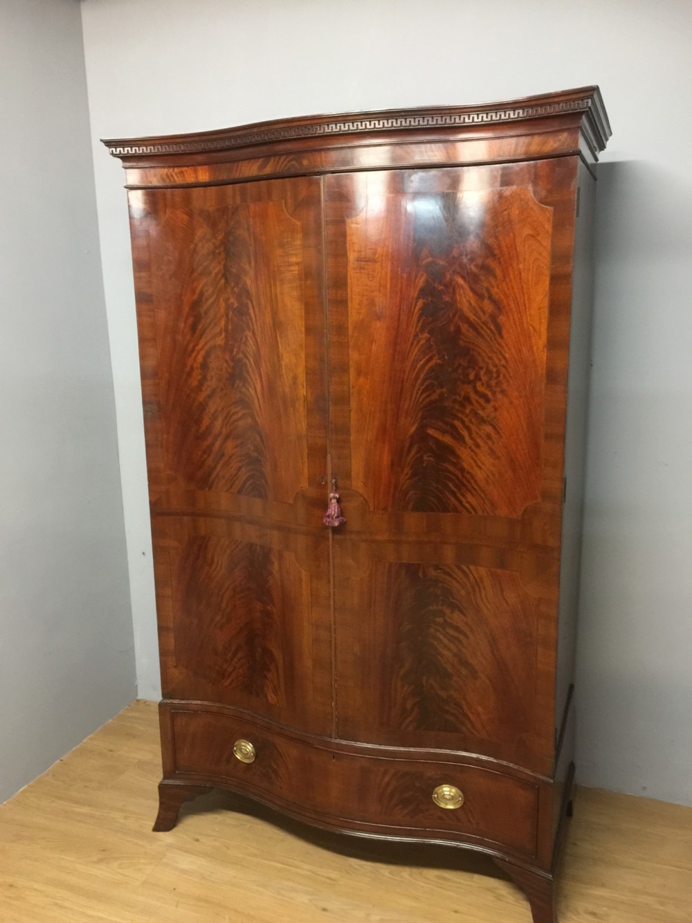 Edwardian Sheraton style serpentine fronted flame mahogany wardrobe  View XI