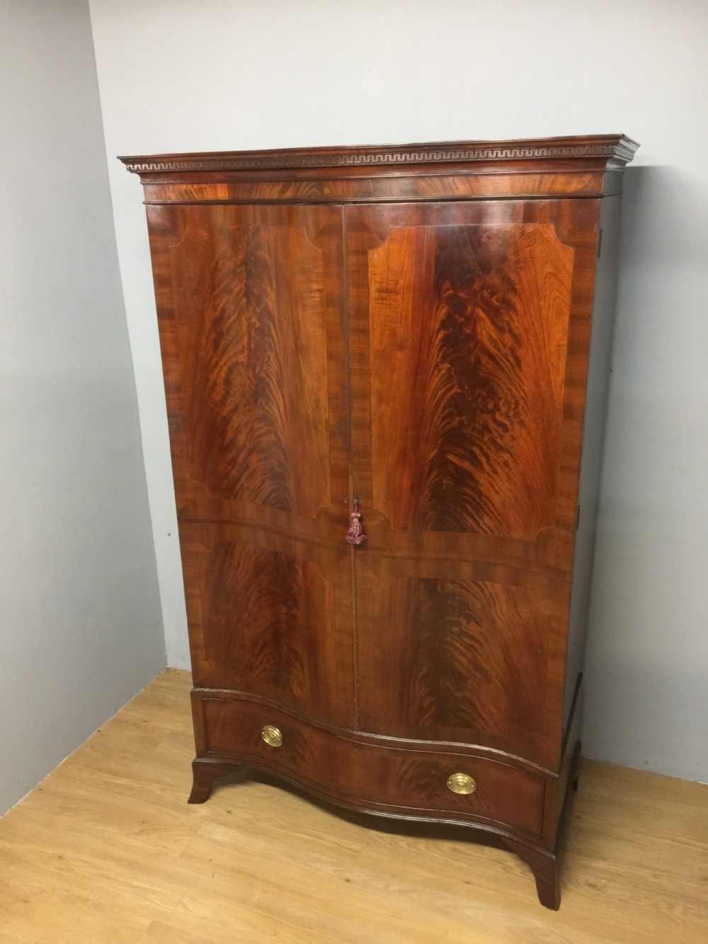 Edwardian Sheraton style serpentine fronted flame mahogany wardrobe  View XII