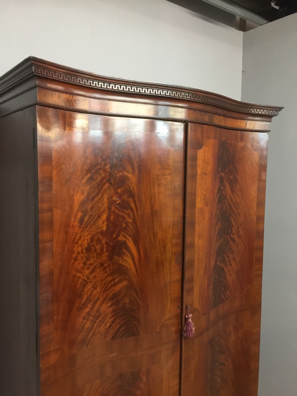 Edwardian Sheraton style serpentine fronted flame mahogany wardrobe  View XIV