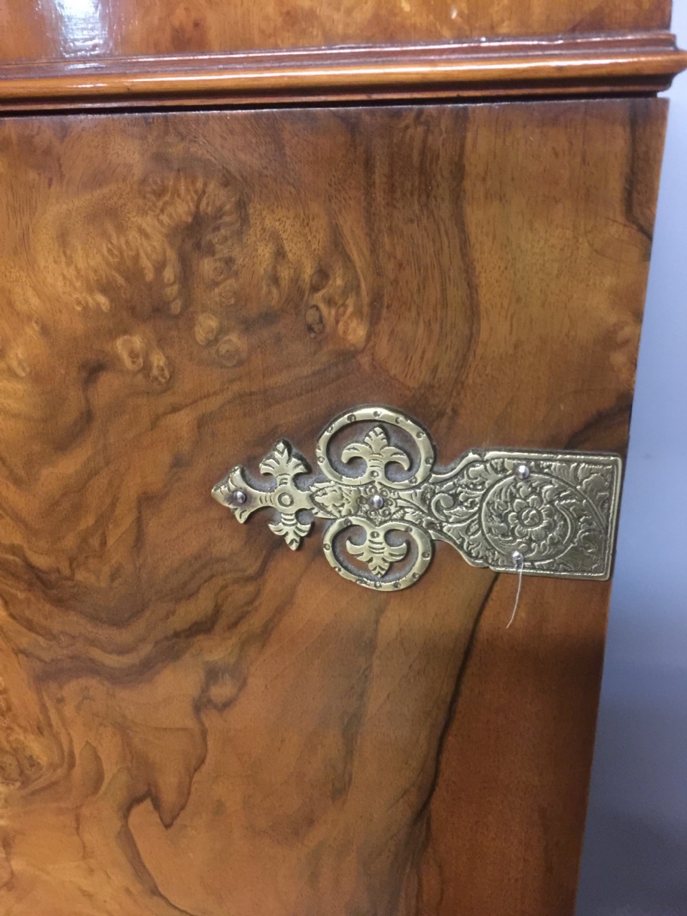 Burr walnut drinks cabinet with ornate brass fittings  View III