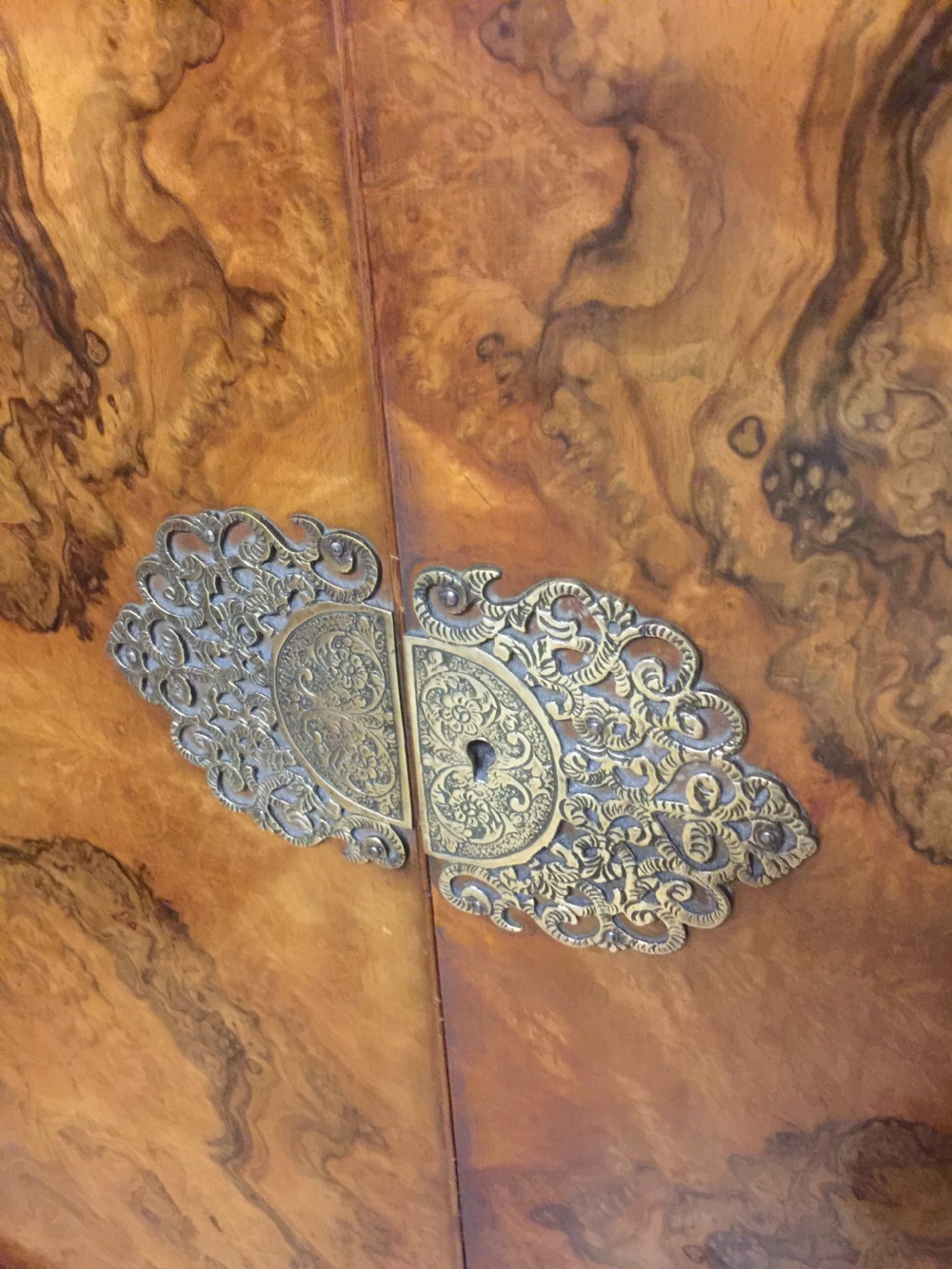 Burr walnut drinks cabinet with ornate brass fittings  View IV