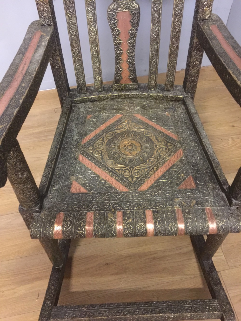 Anglo Indian brass and copper decorated rocking chair View III
