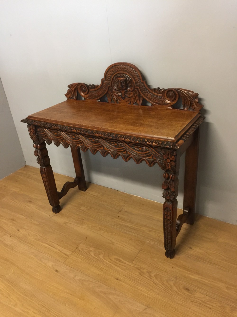 Nineteenth century carved solid oak console table with green man mask View VI