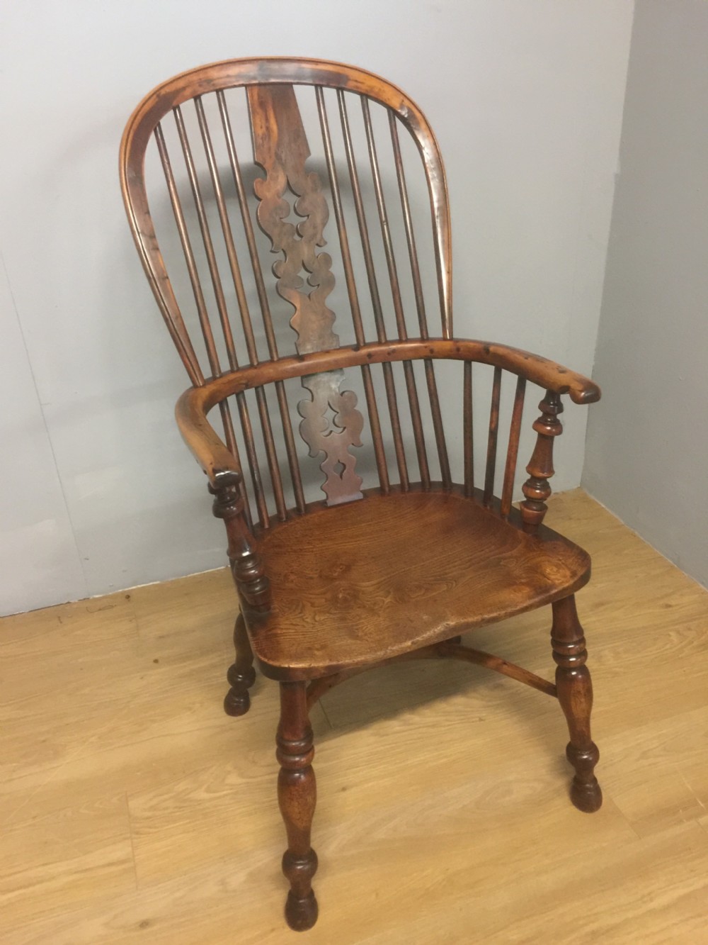 Nineteenth century yew Windsor chair with crinoline understretcher