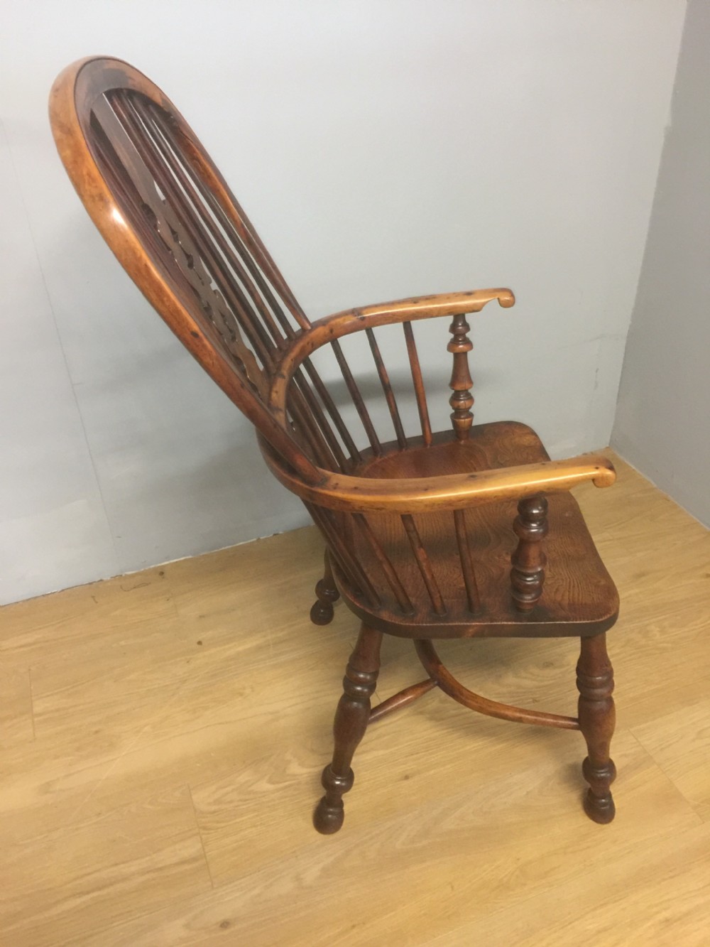 Nineteenth century yew Windsor chair with crinoline understretcher View III