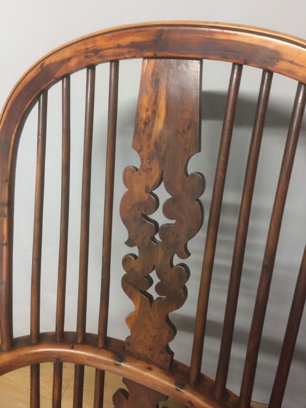 Nineteenth century yew Windsor chair with crinoline understretcher View XI
