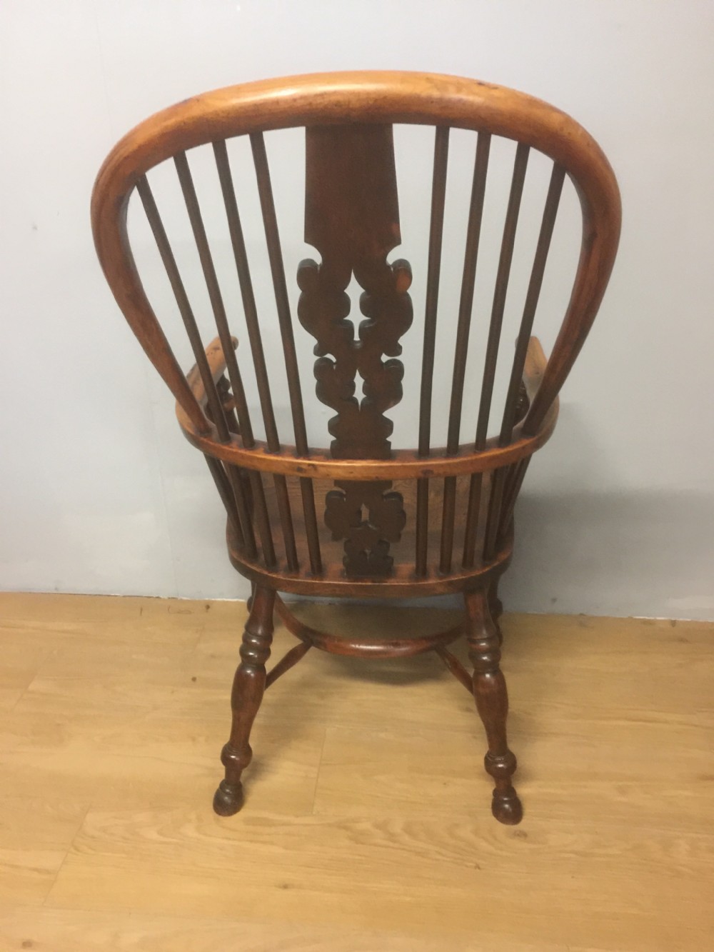 Nineteenth century yew Windsor chair with crinoline understretcher View XII