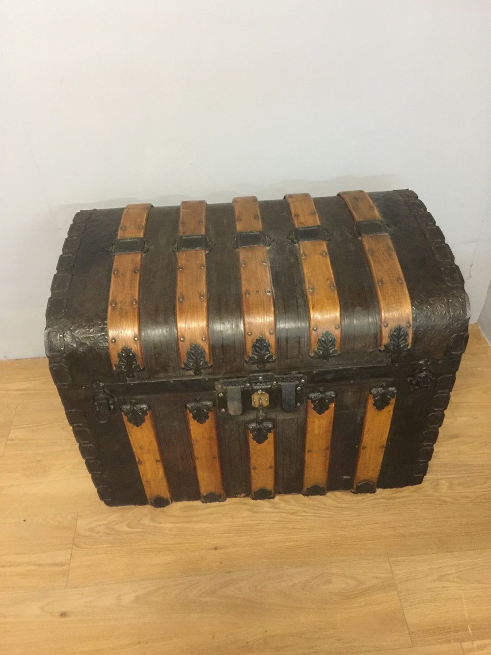 Nineteenth century dome topped wood leather and iron bound trunk  View II