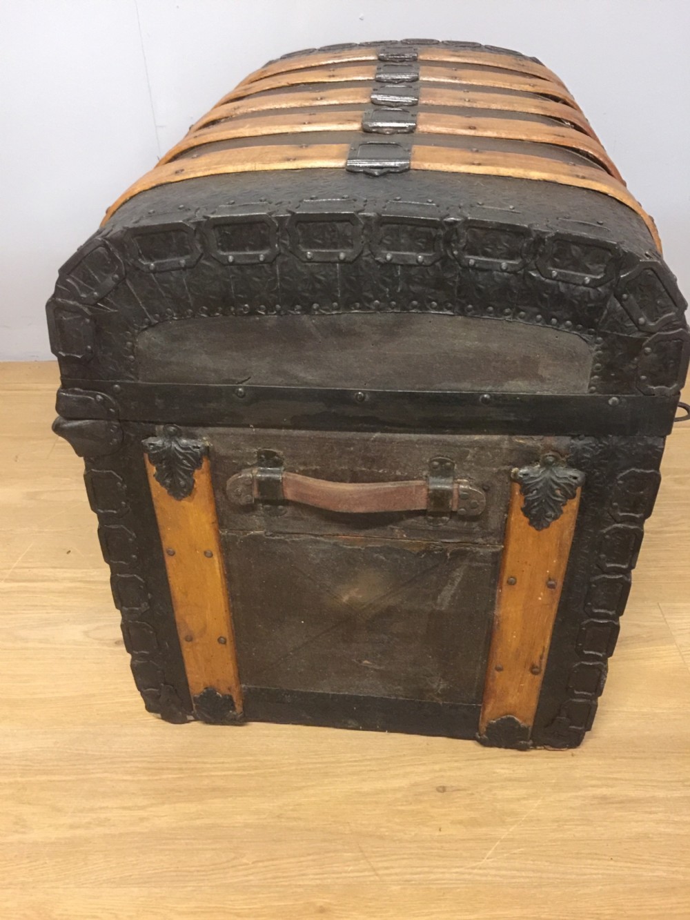 Nineteenth century dome topped wood leather and iron bound trunk  View V