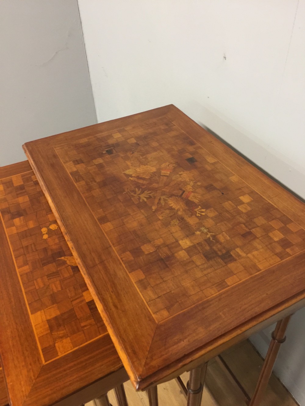 Edwardian quartetto of walnut tables with marquetry and parquetry tops View V