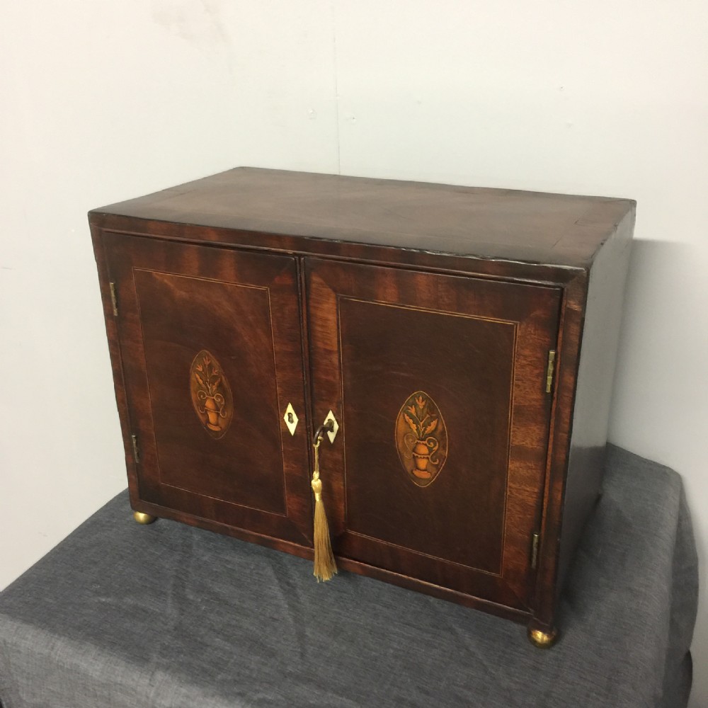 Early nineteenth century small inlaid mahogany spice drawers  