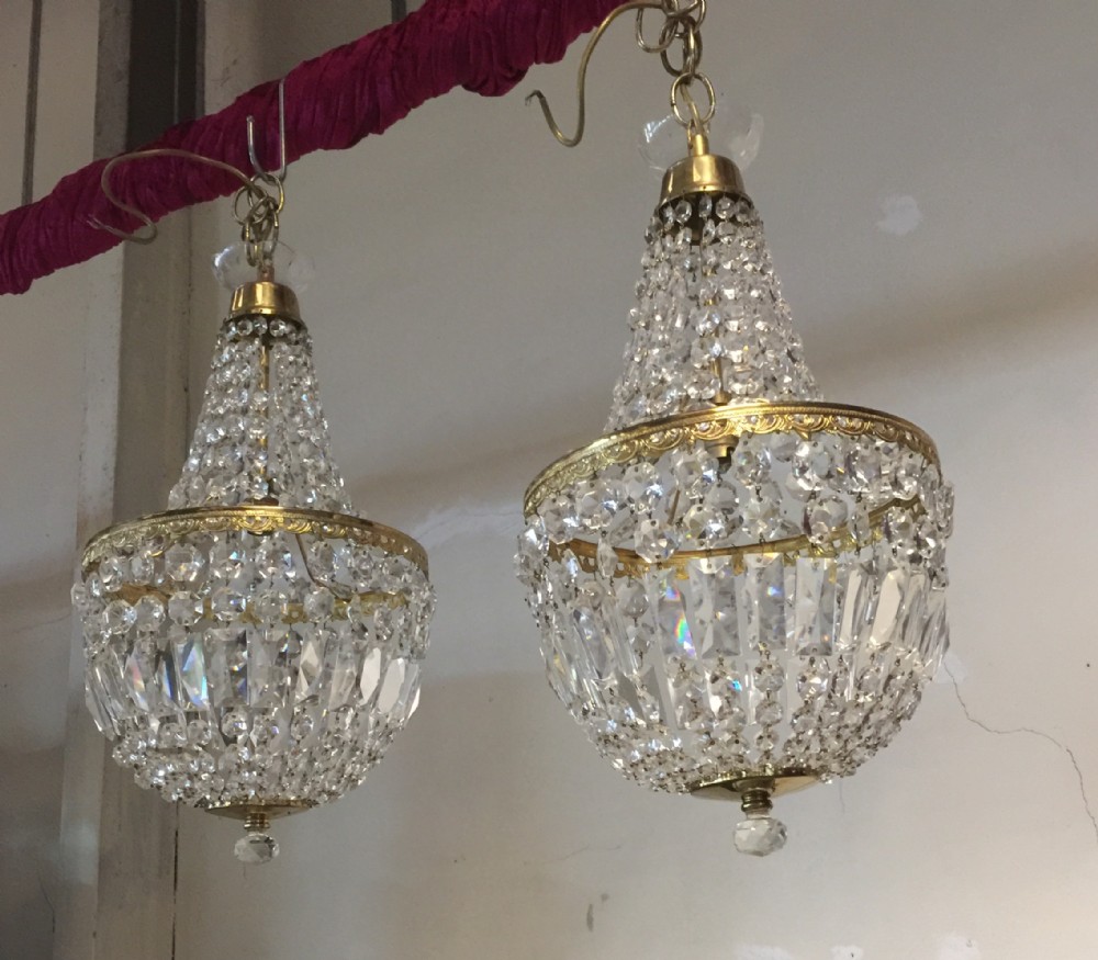 Pair of heavy cut glass empire style chandeliers 