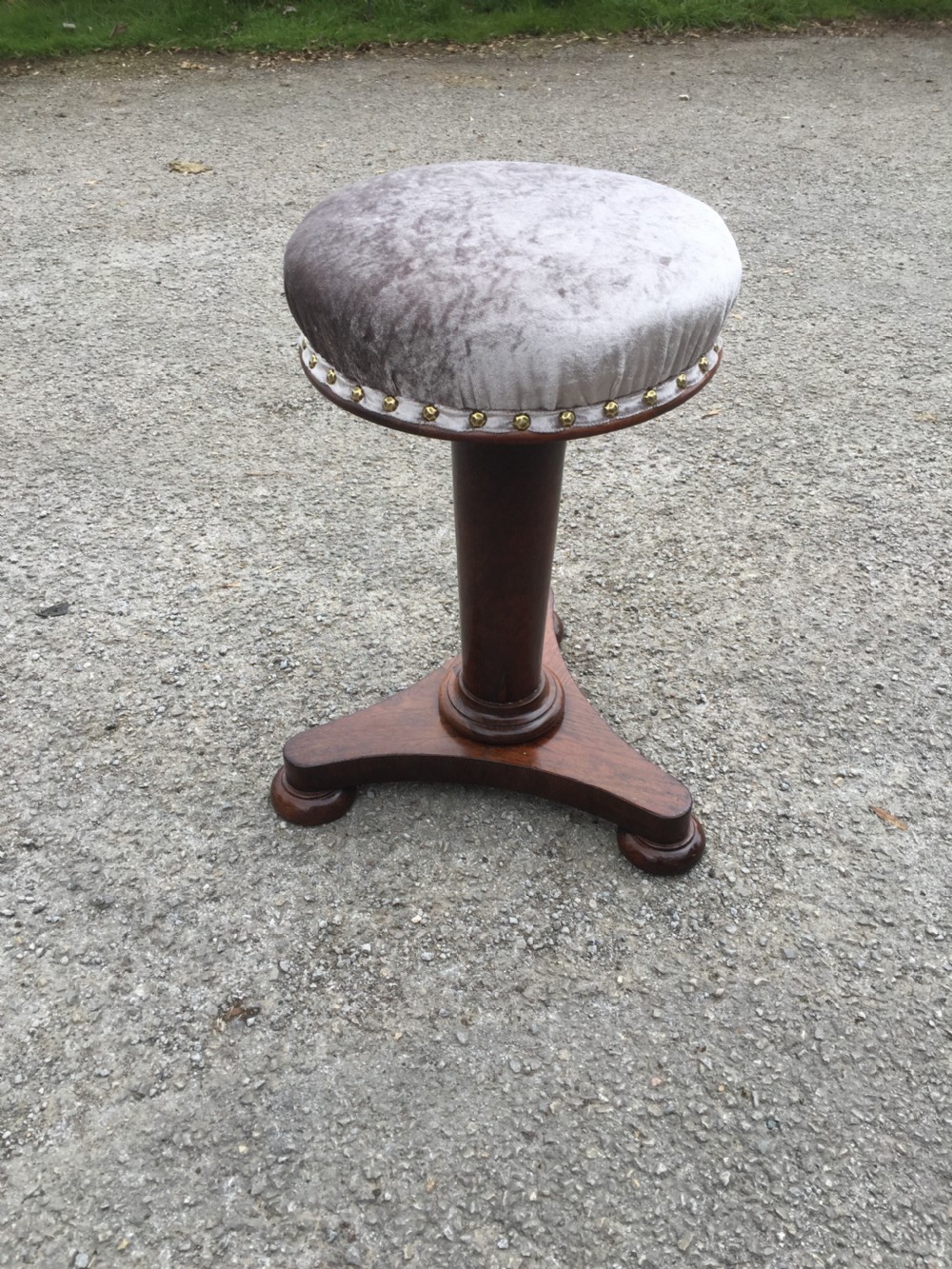 Nineteenth century rosewood circular adjustable piano stool