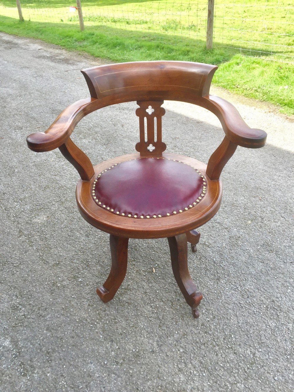 Nineteenth century inlaid mahogany revolving desk chair -red leather 
