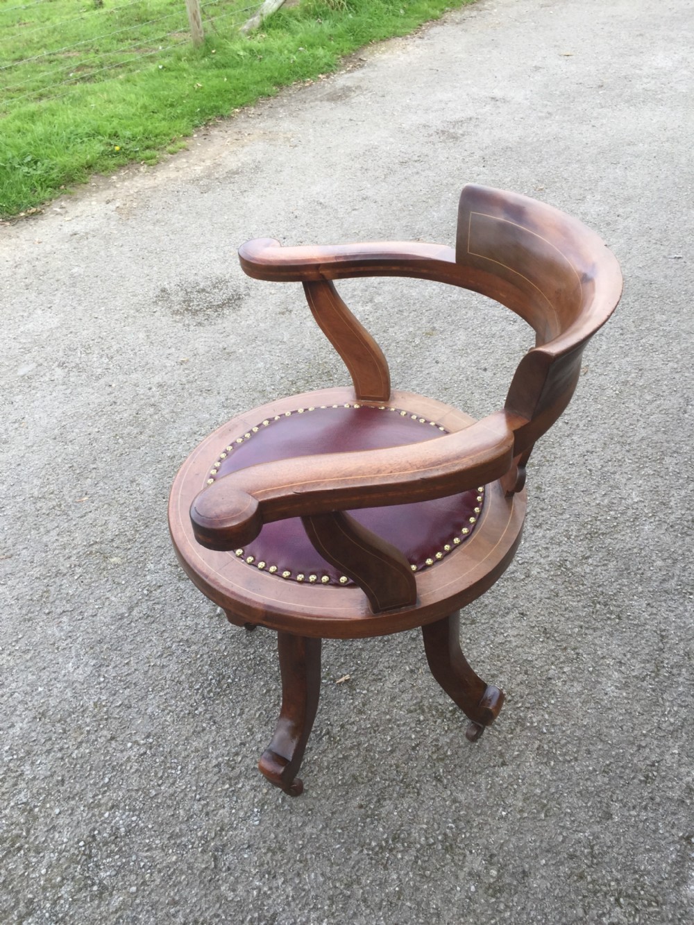 Nineteenth century inlaid mahogany revolving desk chair -red leather  View XI