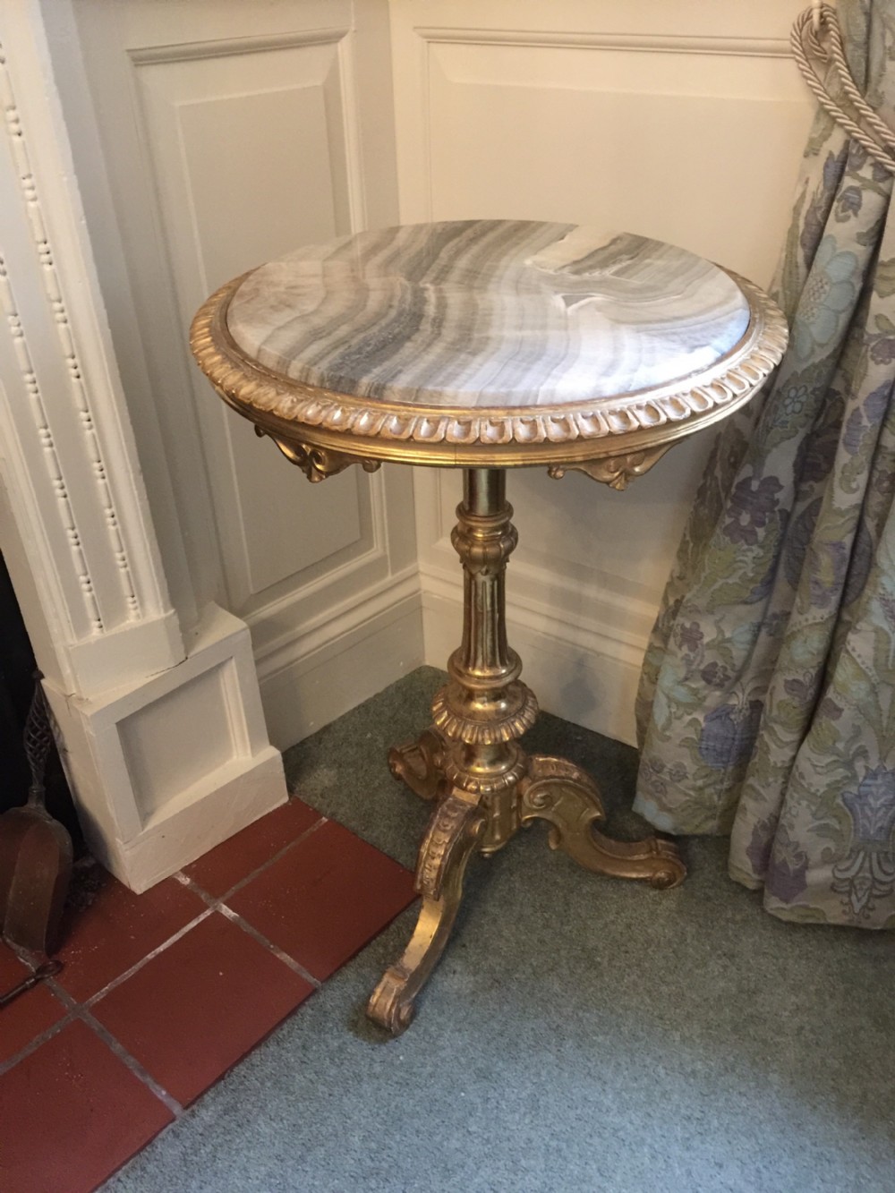 A 19th-century tripod table featuring a carved giltwood pedestal base, egg-and-dart moulding, and a circular variegated grey marble tabletop. View XI