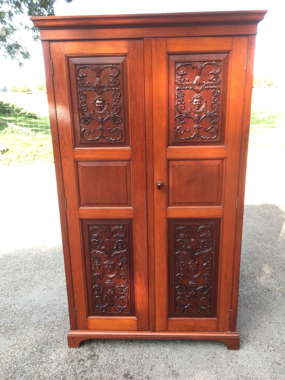 Arts and Crafts walnut hall cupboard with carved panels  View X