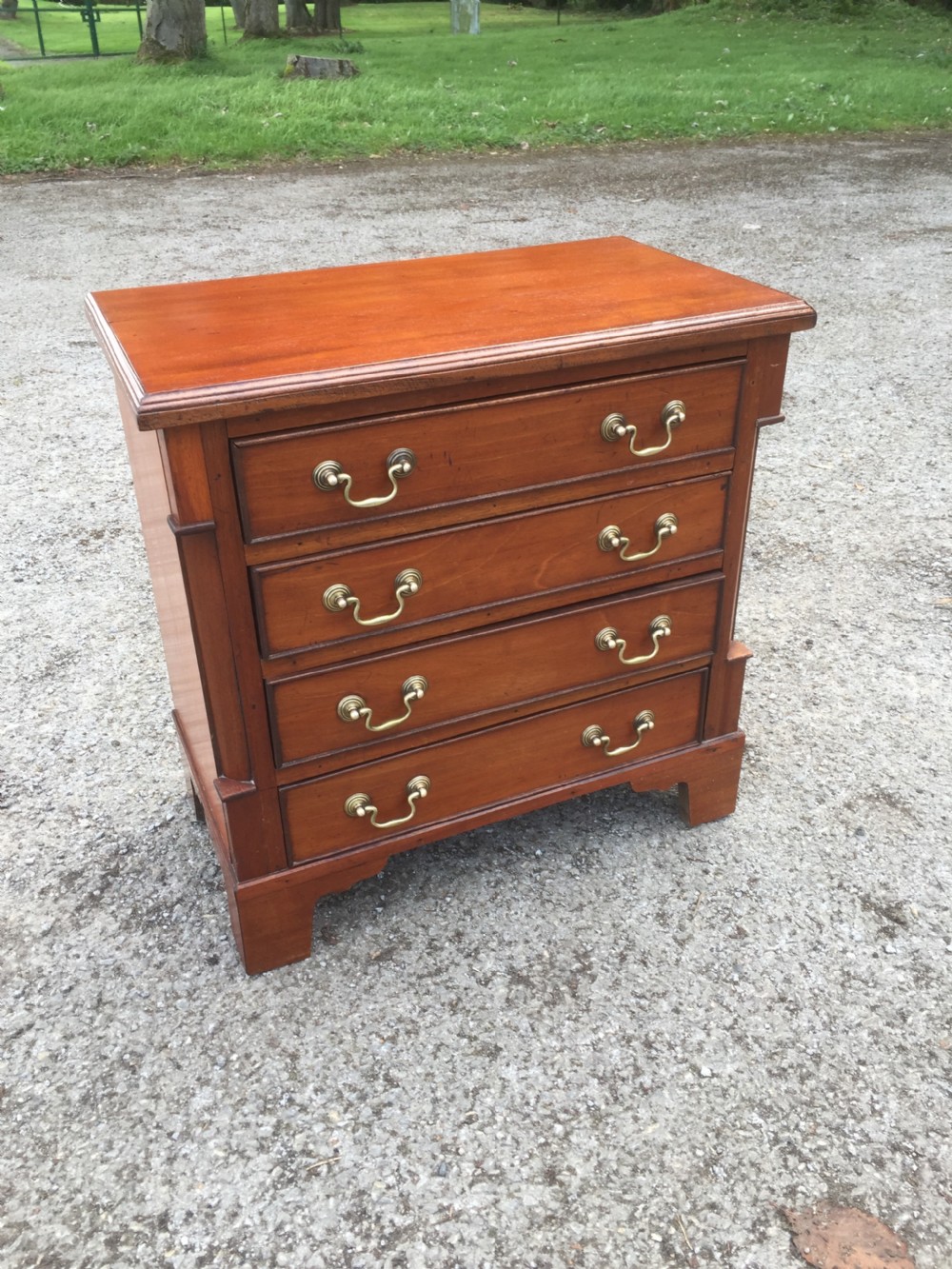 Half size walnut chest of drawers 52 cm high 