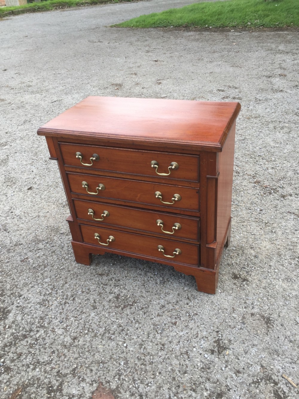 Half size walnut chest of drawers 52 cm high  View II