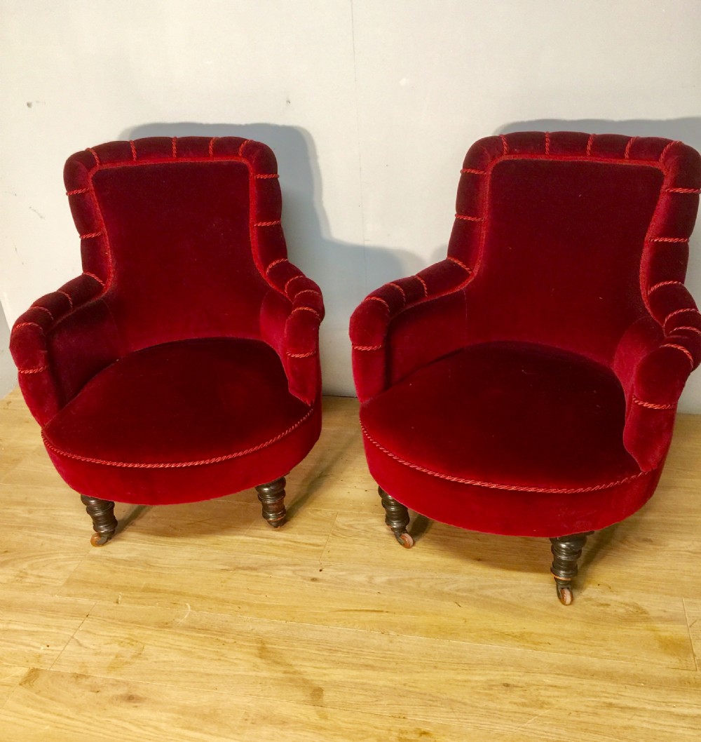 Pair of nineteenth century burgundy velvet tub chairs