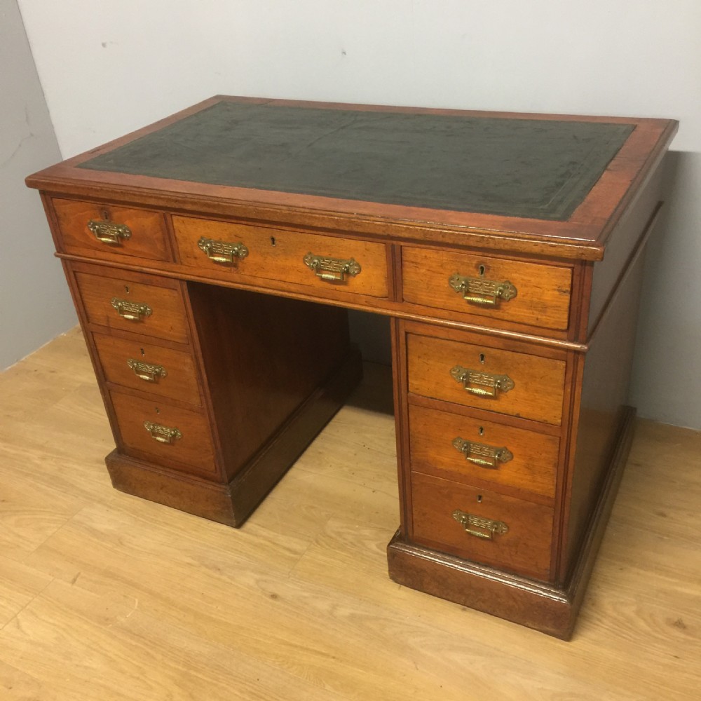 Nineteenth century Walnut twin pedestal desk with inset leather top