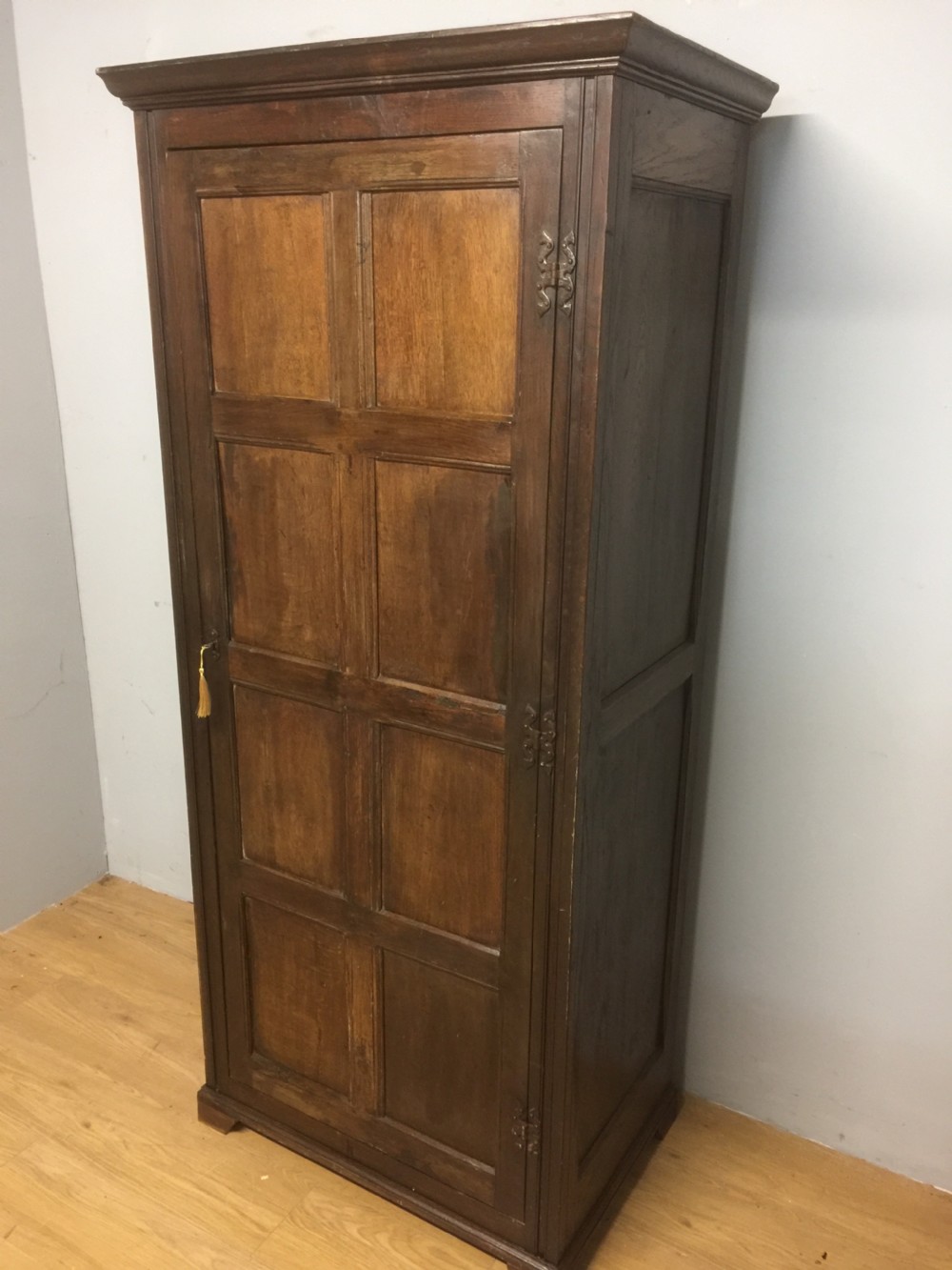 Nineteenth century oak panelled country house hall cupboard View II