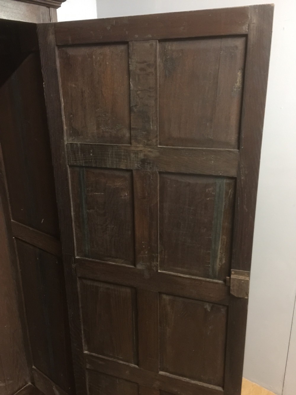 Nineteenth century oak panelled country house hall cupboard View V