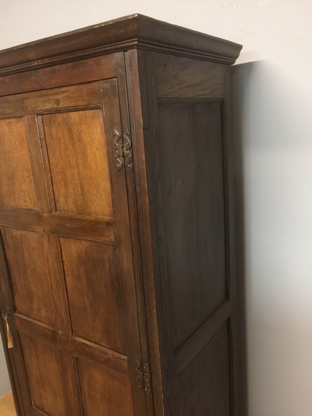 Nineteenth century oak panelled country house hall cupboard View XIII