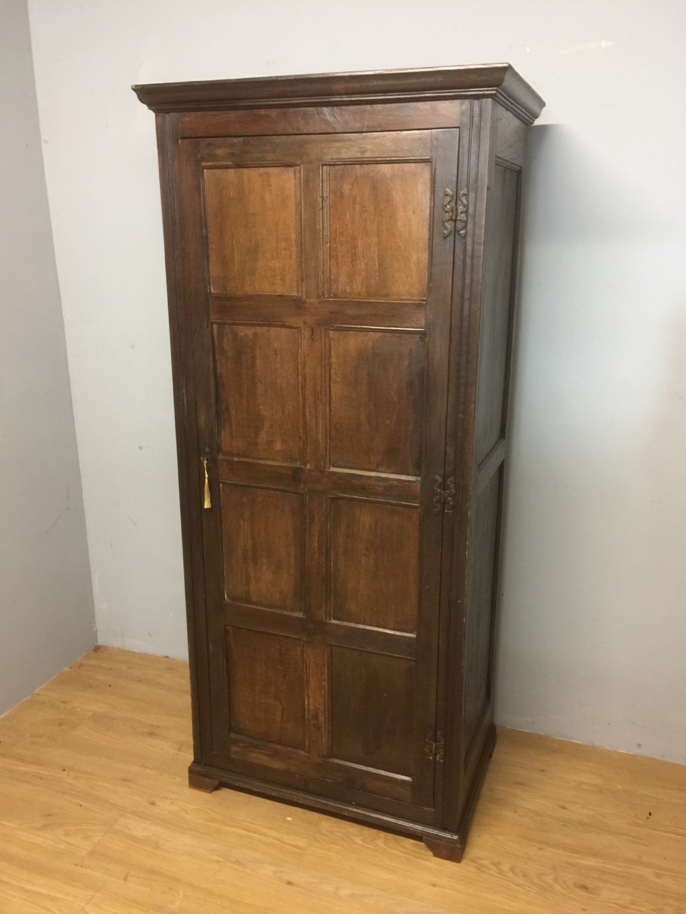 Nineteenth century oak panelled country house hall cupboard View XIV