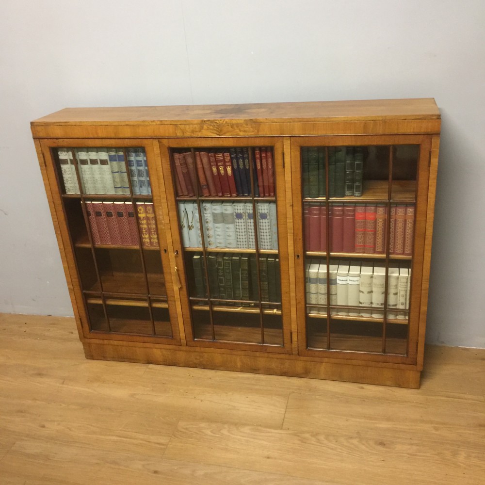 Art Deco walnut freestanding glazed bookcase by Heals of London 
