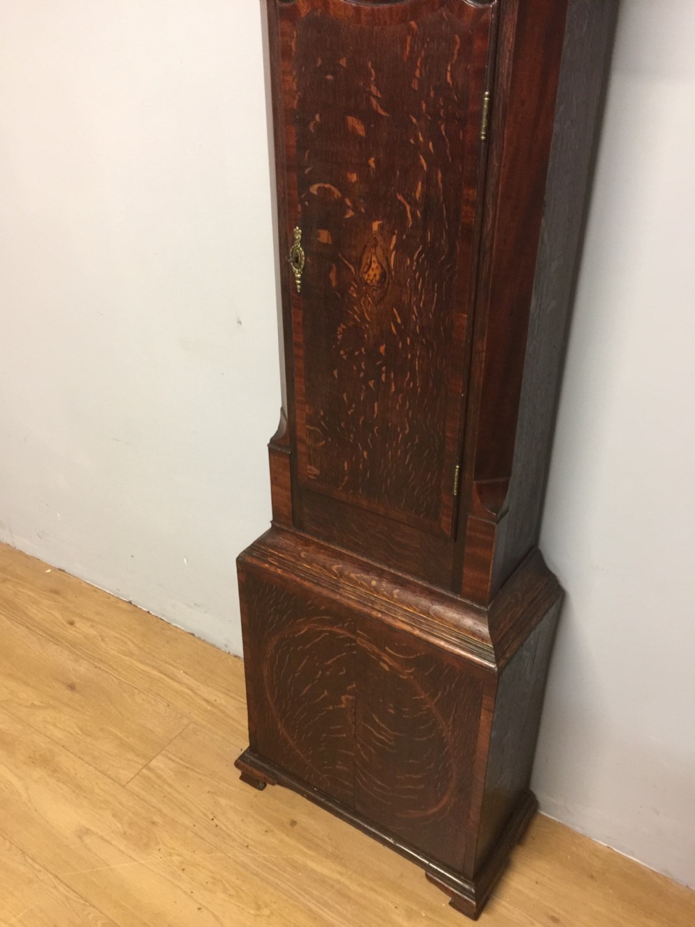 Georgian eight day oak faded long case clock. Working  View IV