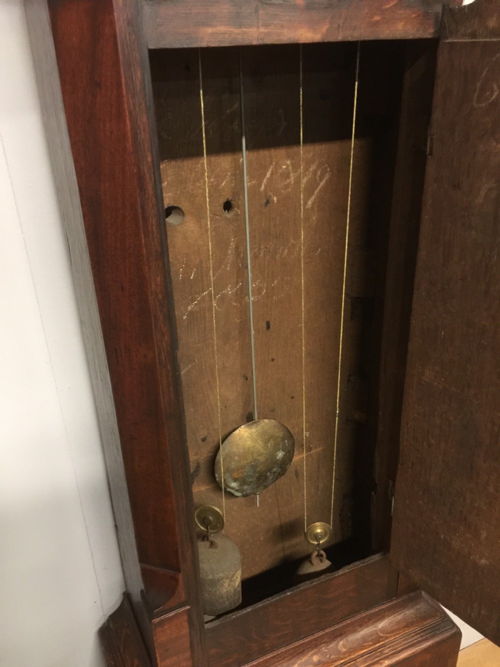 Georgian eight day oak faded long case clock. Working  View IX