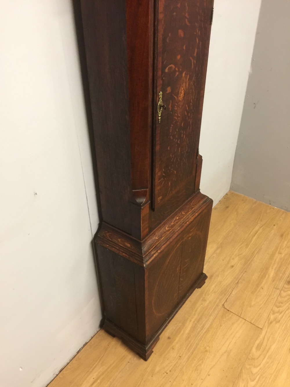 Georgian eight day oak faded long case clock. Working  View XVI