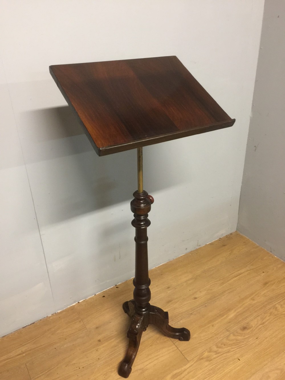 Nineteenth century adjustable lecturn on a tripod base 