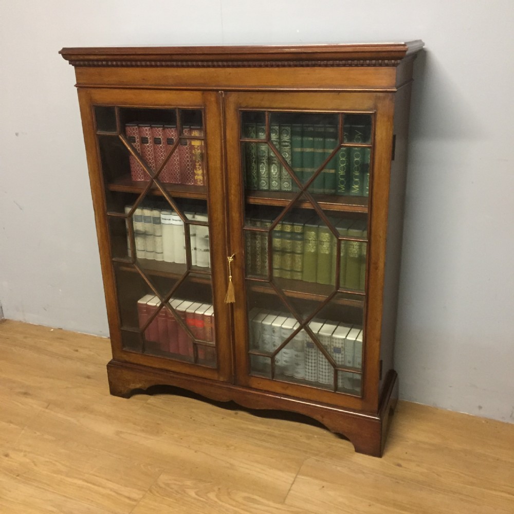 Edwardian mahogany free standing bookcase 