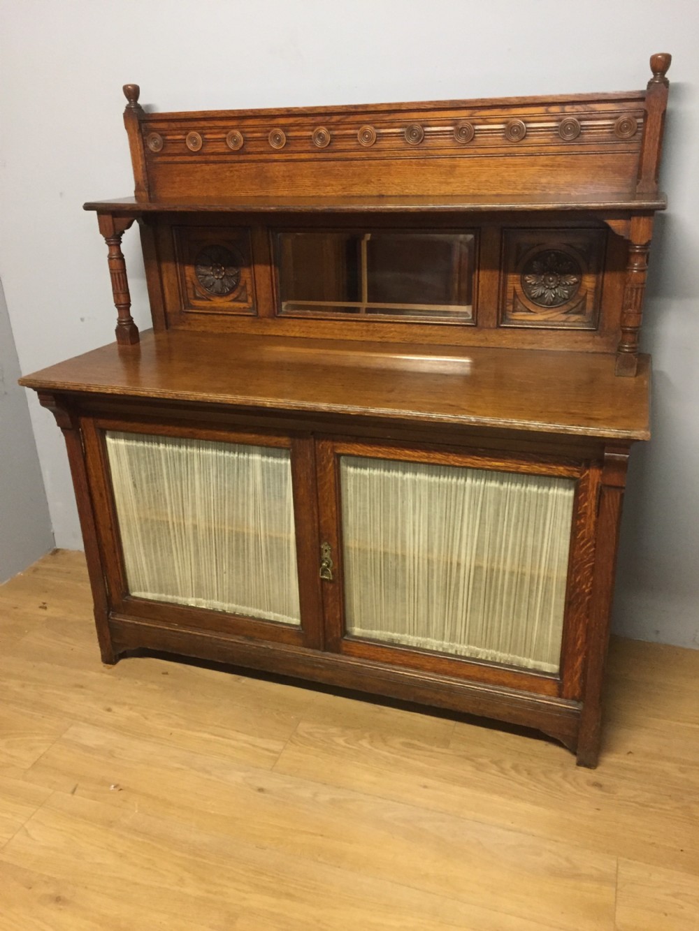 Arts and crafts golden oak chiffonier by Christopher Pratt of Leeds 