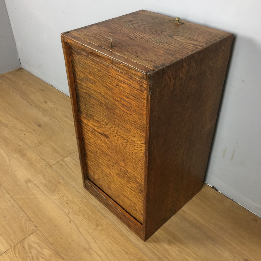 Tambour fronted oak filing cupboard circa 1920