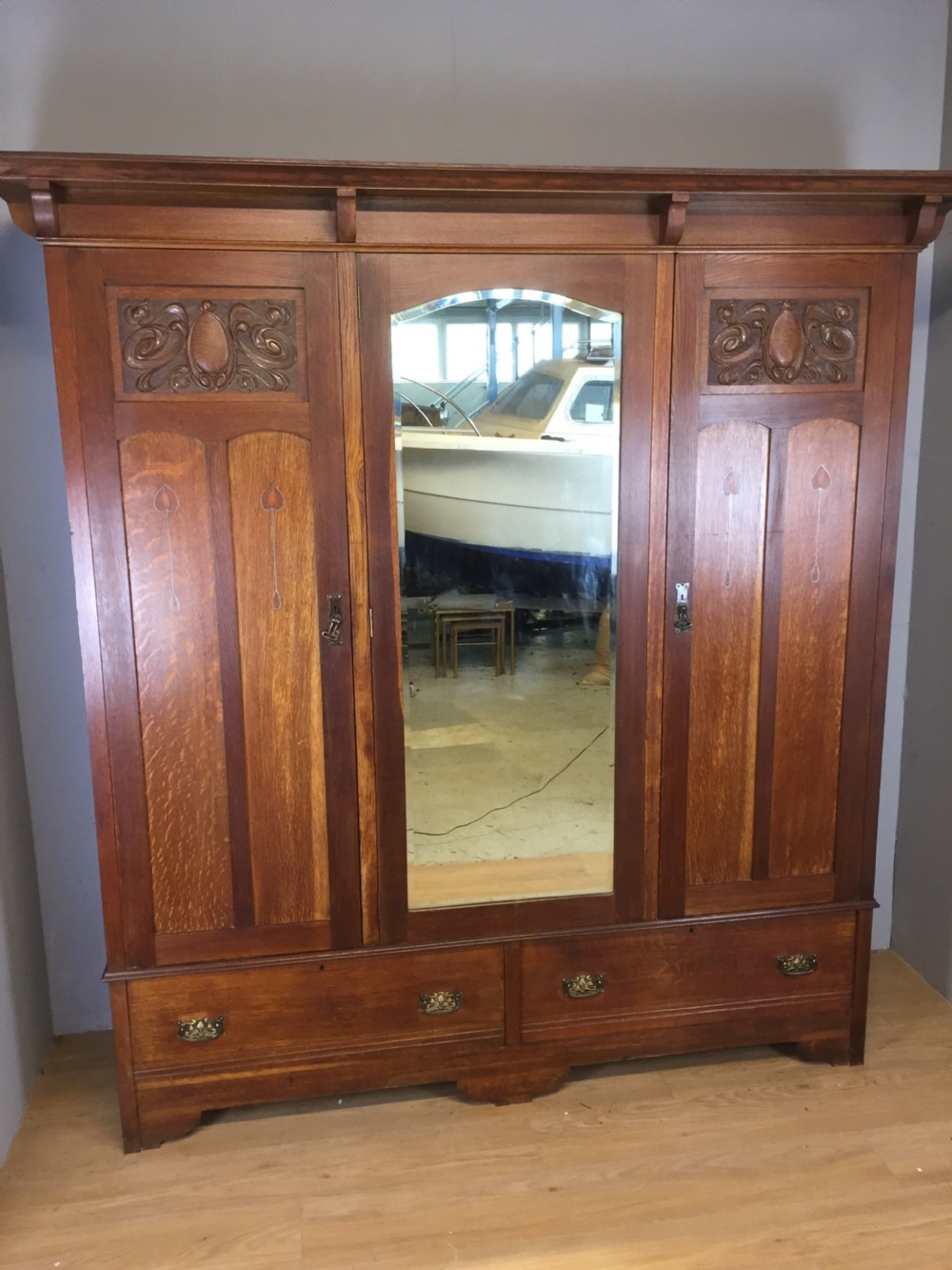 Solid oak Arts and Crafts inlaid three door wardrobe 