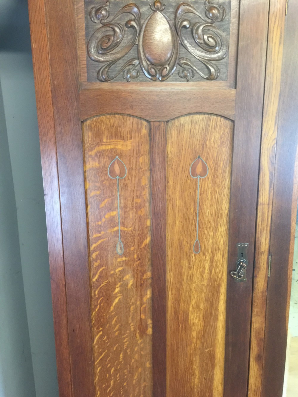 Solid oak Arts and Crafts inlaid three door wardrobe  View V