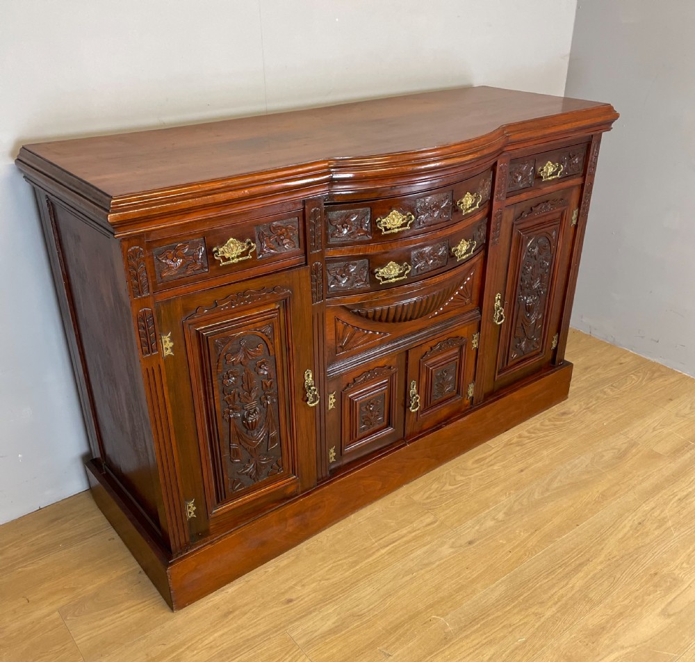 Late nineteenth century carved walnut bow fronted sideboard  View IV