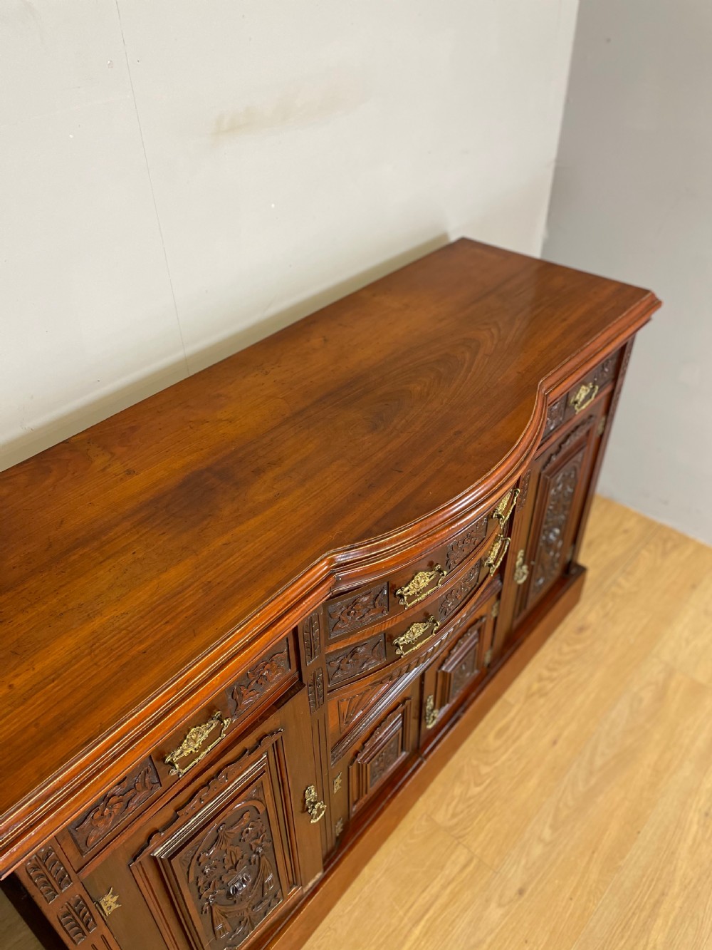 Late nineteenth century carved walnut bow fronted sideboard  View V