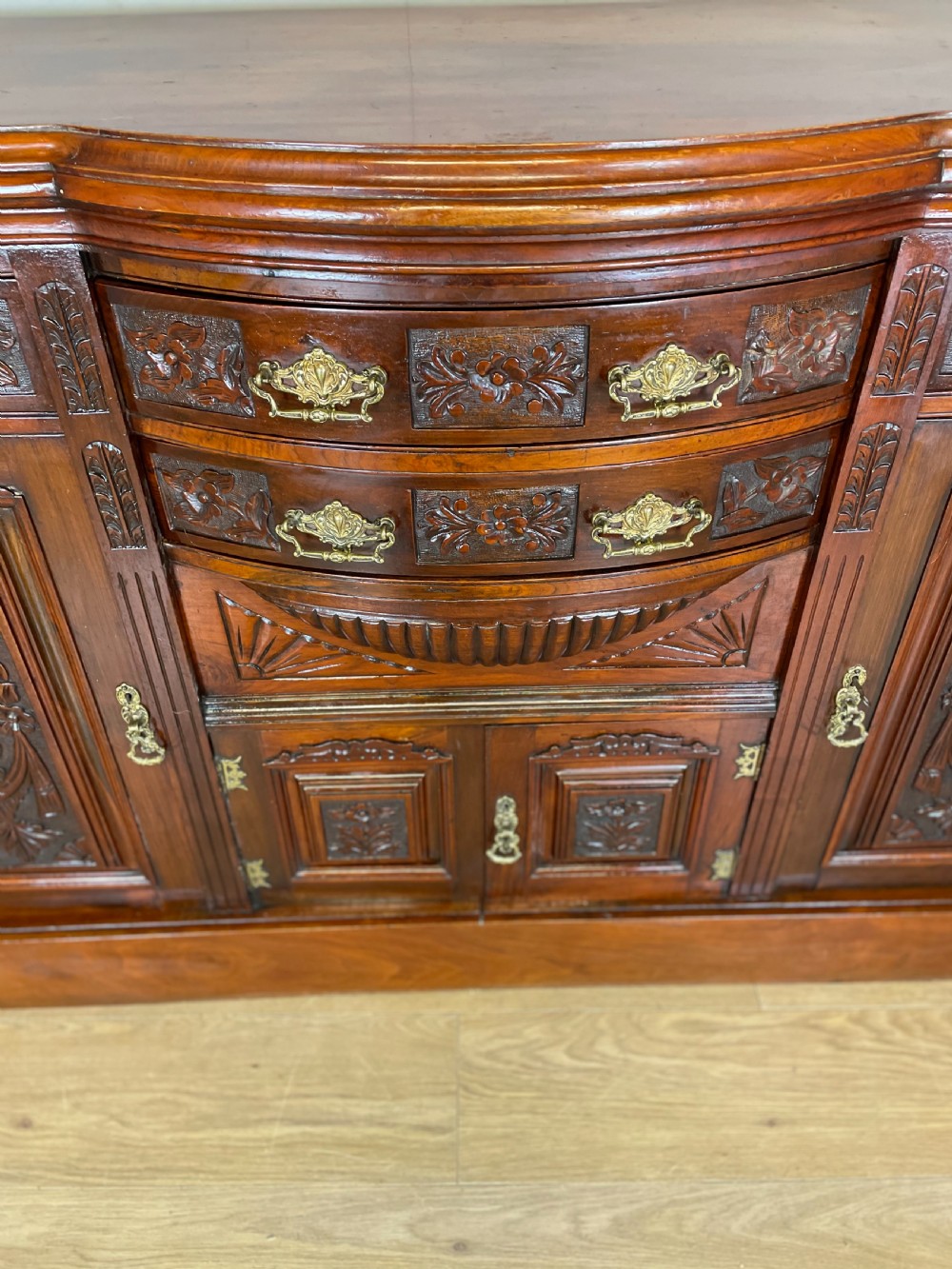 Late nineteenth century carved walnut bow fronted sideboard  View VIII
