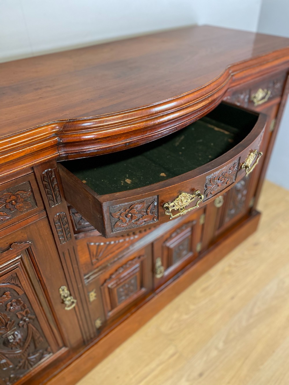 Late nineteenth century carved walnut bow fronted sideboard  View IX