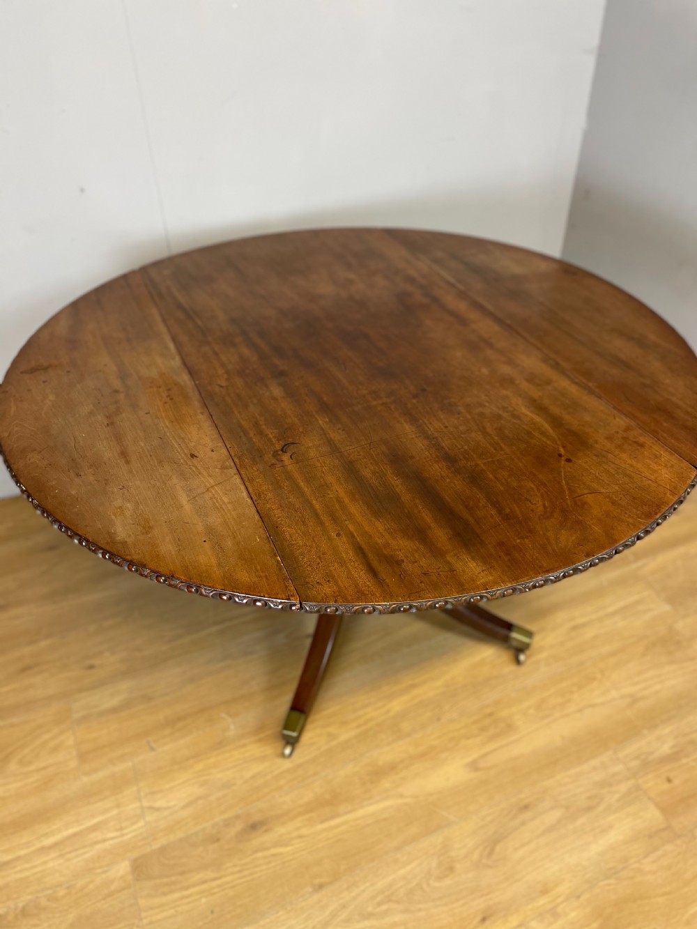 Regency mahogany circular drop leaf dining table  View II