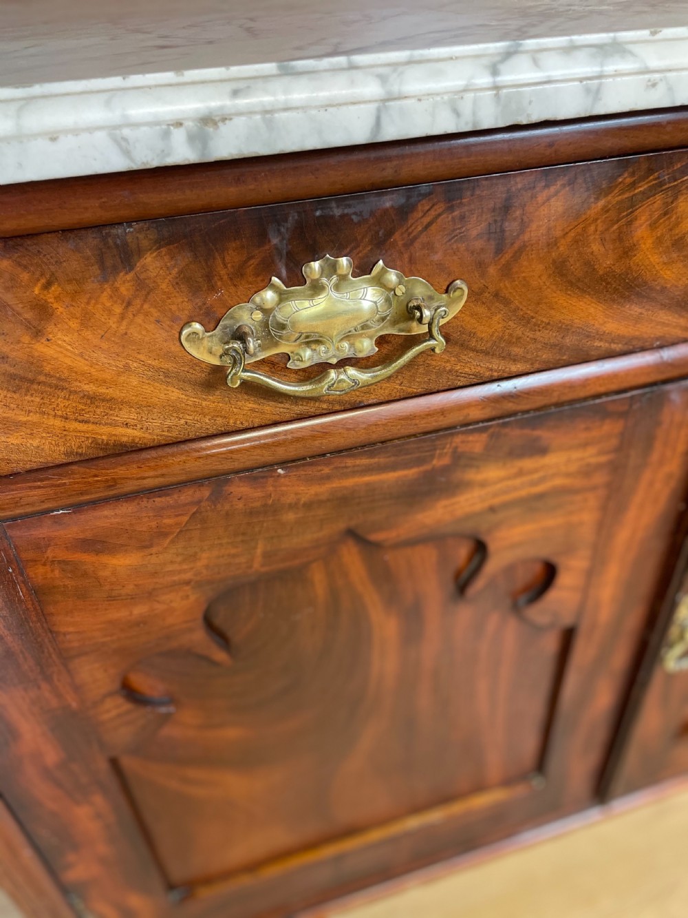 Nineteenth century Flame mahogany marble topped side cabinet  View II
