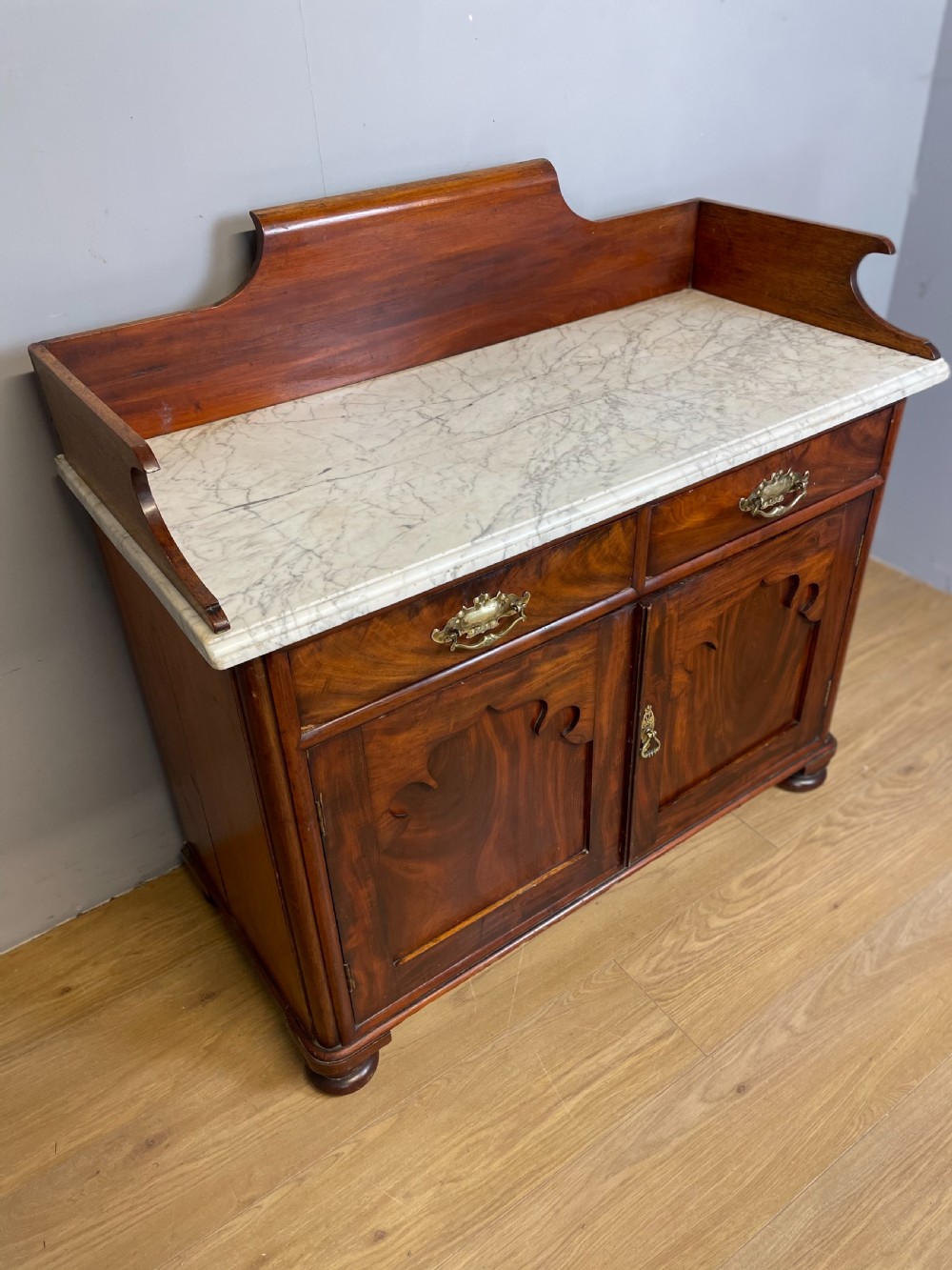 Nineteenth century Flame mahogany marble topped side cabinet  View III