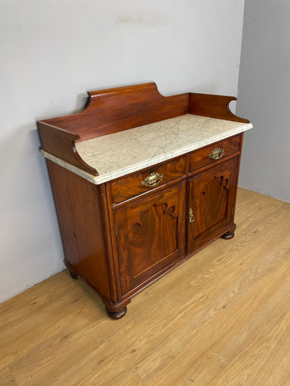 Nineteenth century Flame mahogany marble topped side cabinet  View V