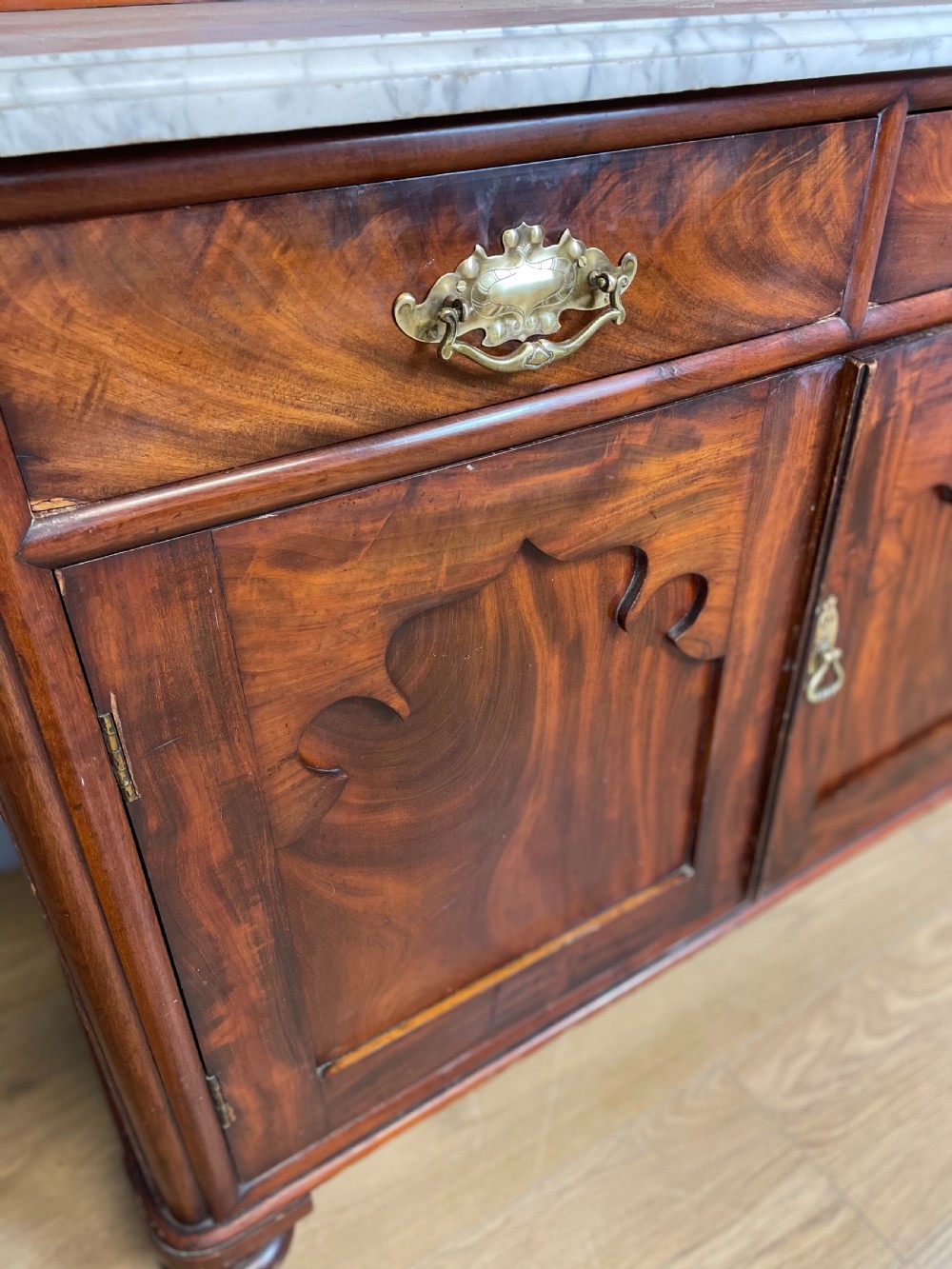Nineteenth century Flame mahogany marble topped side cabinet  View VI