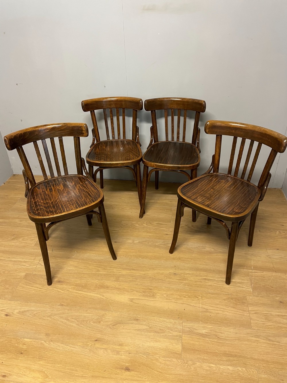 Set of four bentwood cafe chairs 